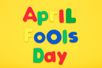 Text April Fool's Day on yellow background