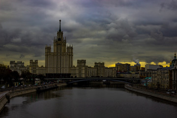Fototapeta na wymiar Moscow, Park Zaryadye / View at Stalin's skyscraper on Kotelnicheskaya Embankment and Moscow river.