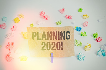 Conceptual hand writing showing Planning 2020. Concept meaning process of making plans for...