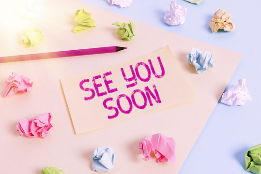 Handwriting text writing See You Soon. Conceptual photo used for saying goodbye to someone and going to meet again soon Colored crumpled papers empty reminder blue yellow background clothespin
