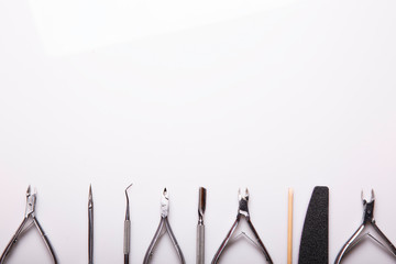 professional manicure tools on a white background.