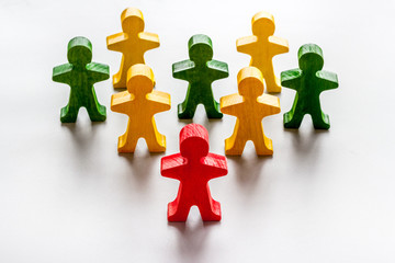 Tolerance, human rights, anti-discrination concept. Wooden figures of people on white table, top view