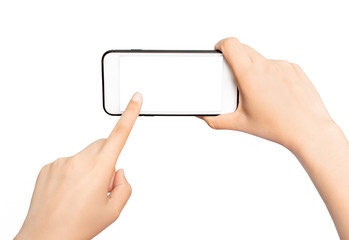 Women's hand holding a smartphone with a blank screen, isolated on a white background