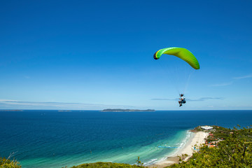 Paragliding flying over Thailand island