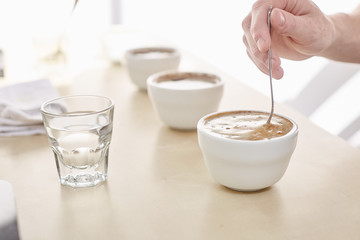 stirring coffee cupping bowl