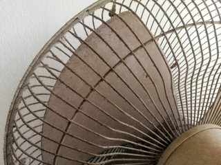Dust on the fan, Dirty fan full of dust on the fan blade and grill may causing allergy and health problem