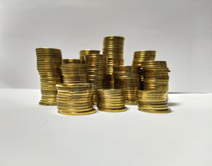 Many stacks of neat golden coins
