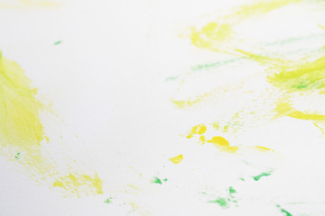 abstract image green and yellow watercolor paint on white paper background
