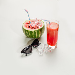 Watermelon juice with a straw , summer concept, romantic couple entertaining event at home