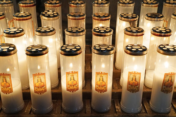  Europe, Italy , Tuscany march 2020  candles to be lit in prayer in the church of Arezzo           ...