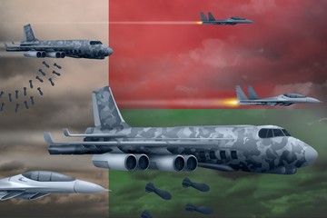 Madagascar air forces bombing strike concept. Madagascar army air planes drop bombs on flag background. 3d Illustration