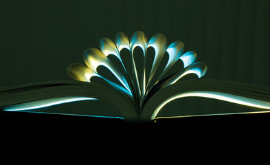 Creative decoration using open book and lighting