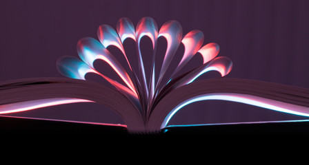 Creative decoration using open book and lighting