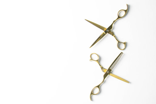 Open scissors for haircut isolated on a white background