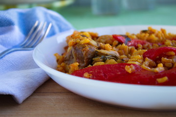 delicious rice dish with ribs, red peppers and artichokes