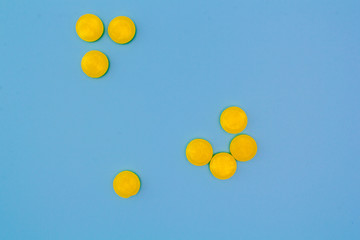 pills on blue background
