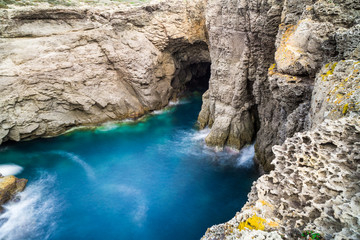 Fototapeta na wymiar The magnificent Cala Grotta in Sant'Antioco, Sardinia