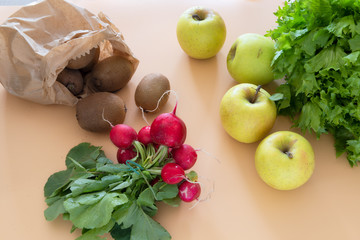 radish bunch on orange background