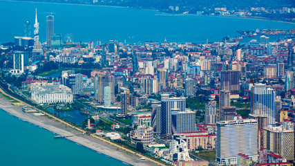 Fototapeta na wymiar Batumi, Georgia - June 09, 2015: Aerial view of seaside city on Black Sea coast, Batumi, Georgia.