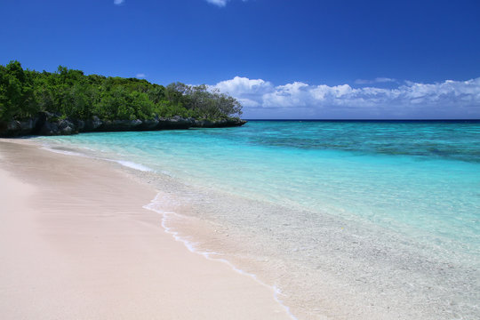 Sandy beach at Gee island in Ouvea lagoon, Loyalty Islands, New Caledonia
