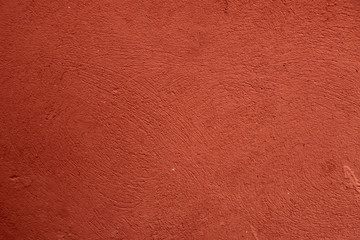 Orange surface with small chips and bumps. Orange background for design.