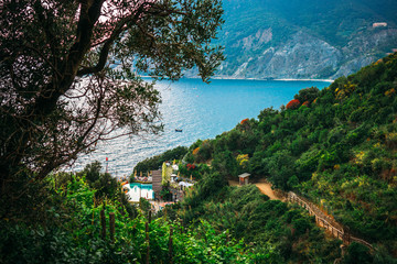 Beautiful wide panoramic view of Mediterranean turquoise sea visible from the hiking Cinque Terre trail from Vernazza to Monterosso al Mare in Italy. 