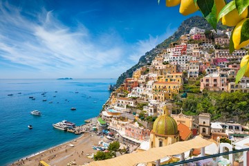 Beautiful Positano with comfortable beach and blue sea on Amalfi Coast in Campania, Italy. Amalfi...