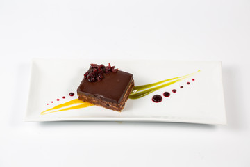 Garash cake in plate on a white background