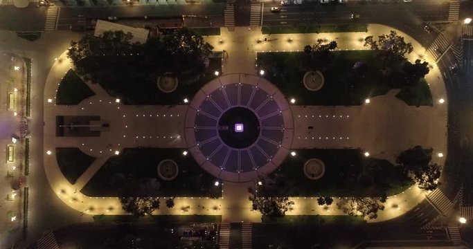 Aerial Drone Scene at night of May Square and Casa Rosada. Landscape of the pyramid and pink house, historic building. Buenos Aires, Argentina.