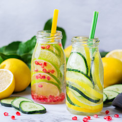 Obraz na płótnie Canvas Fresh cool lemon cucumber rosemary infused water detox drink