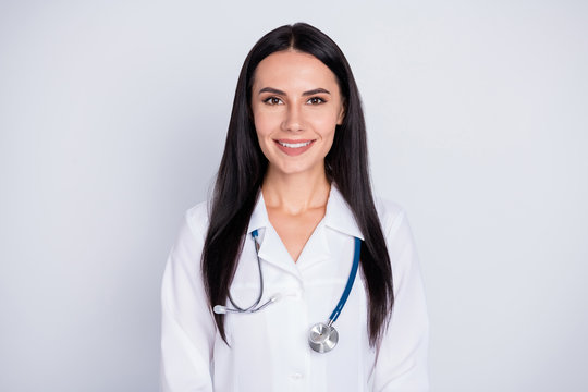 All is well. Photo of attractive doctor practitioner lady good mood friendly smiling to patients wear white lab coat stethoscope isolated grey color background