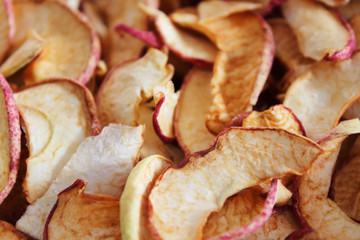 Dried chopped apples. Close-up. Top view. Selective focus. Background. Texture.