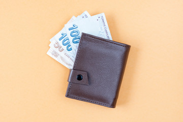 wallet with money isolated on white background