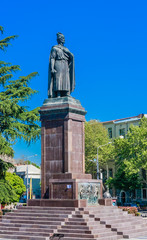 Fototapeta na wymiar Monument to the outstanding Georgian poet and statesman of the 12th century Shota Rustaveli in the center of Tbilisi. Republic of Georgia