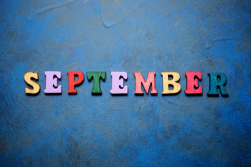 Naklejka premium September word view