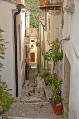 A narrow street between the houses of Monteroduni, a medieval village in the Molise region, Italy