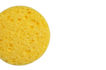 Yellow cosmetic sponge for washing on a white background