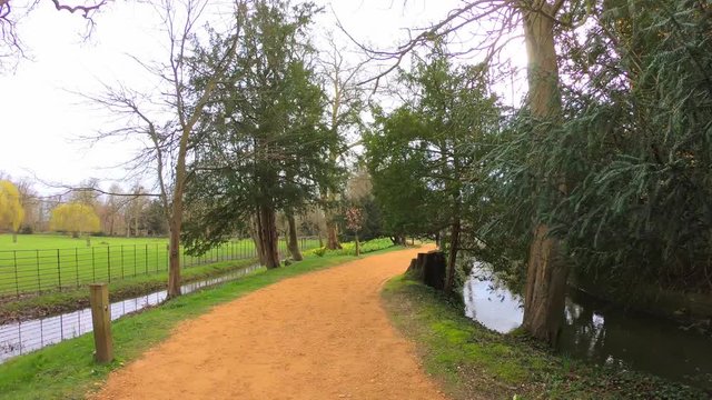 Oxford, UK, March 17, 2020: Hyperlapse in Magdalene College Fellows Gardens and Oxford Church