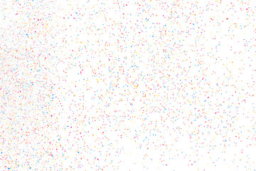 Abstract explosion of confetti. Colorful grainy texture isolated on white background. Colored stains and blots. Vector overlay elements. Digitally Generated Image. Illustration, Eps 10.