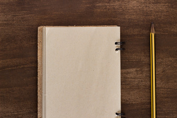 old notebook to aim with a pen