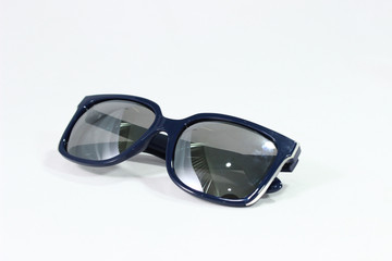 stylish sunglasses with a blue frame on a white background