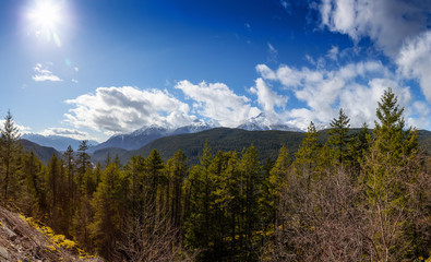 Panoramic Canadian Landscape View of the fog covered valley during a cloudy day. Taken in Tantalus Lookout near Squamish and Whistler, North of Vancouver, BC, Canada. Background Panorama