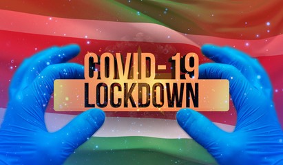 Fototapeta na wymiar COVID-19 lockdown concept with backgroung of waving national flag of Suriname. Pandemic 3D illustration.