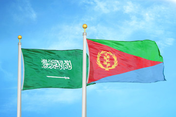 Saudi Arabia and Eritrea two flags on flagpoles and blue cloudy sky