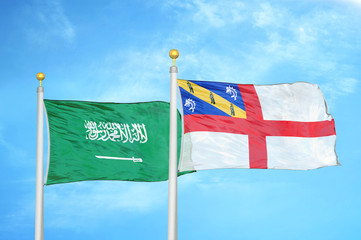 Saudi Arabia and Herm two flags on flagpoles and blue cloudy sky
