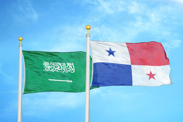 Saudi Arabia and Panama two flags on flagpoles and blue cloudy sky