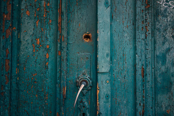 Blue door textured rustic wood and handle