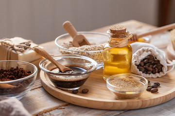 Concept of home beauty care and natural organic ingredients in cosmetology. Coffee, honey, oil, oat for gentle skin peeling and moisturizing. Health care lifestyle. Wooden background closeup