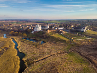 Beautiful view of Zimnensky Svyatogorsky monastery from above. View of the domes and the Assumption Cathedral.