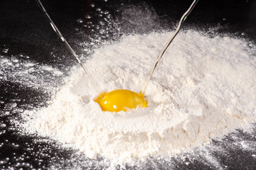  the egg is broken into flour1